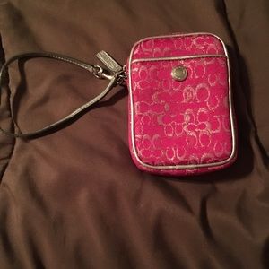 COACH. Multi function case